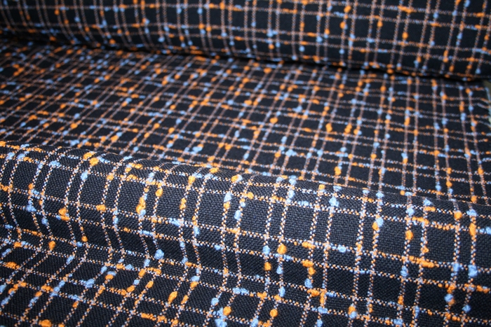 Navy uld bouclé med lyseblå og orange tern