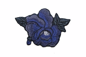 Symærke blå blomst