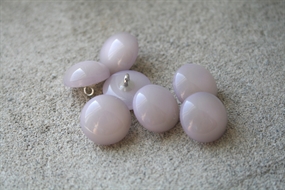 Lyselilla halvkugleformet øjeknap