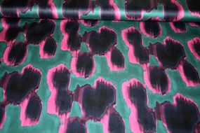 Bomuldssatin med abstrakt print i pink og grøn