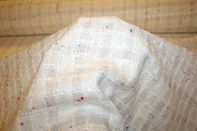 Hvid ternet uld bouclé stof