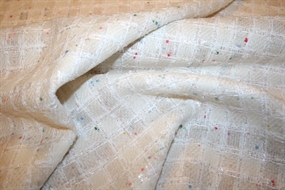 Hvid ternet uld bouclé stof