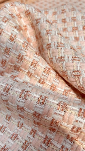 Feminin uld bouclé i lyse farver