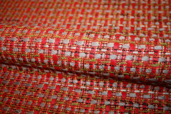 Italiensk bouclé stof i røde, grå og grønne nuancer