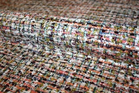 Multifarvet bouclé stof