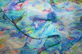 Silke georgette med akvarelblomster i klare farver