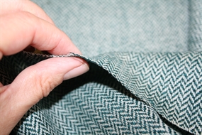 Petrol/sand sildebensvævet uld stof fra Italien