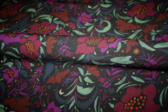 Vævet viskose med blomster, sol, måne og stjerner